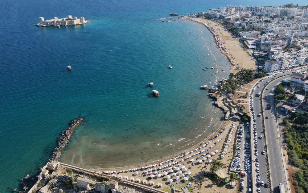 Okullar tatil olmadan sahillerde yoğunluk başladı